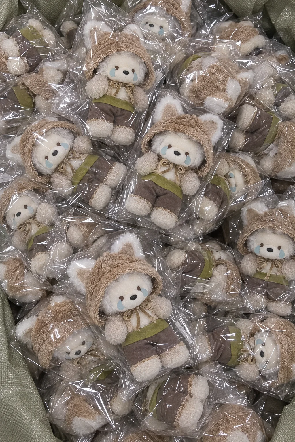 Mass-produced crying puppy plush toys in individual packaging